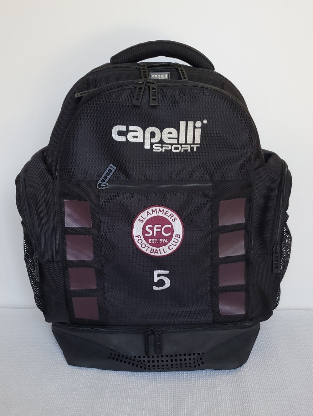 Capelli Sport Slammers Football Club Black 4-Cube Backpack with Maroon Accents